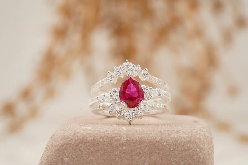 Alexandrite Gemstone Rings with a Chameleon - like Color ChangePear Ruby Cluster Ring with Moissanite Enhancer wedding band