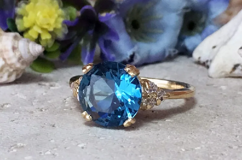 Garnet Gemstone Rings with a Vintage - Style Bezel SettingBlue Topaz Ring - December Birthstone - Round Blue Topaz Statement Engagement Ring with Clear Quartz Accents