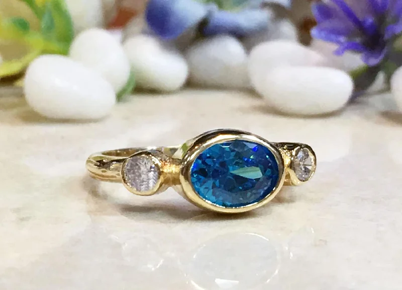 Morganite Gemstone Rings with Rose Gold AccentsBlue Topaz Ring - December Birthstone - Bezel Set Ring with Oval Blue Topaz Gemstone and Clear Quartz Accents