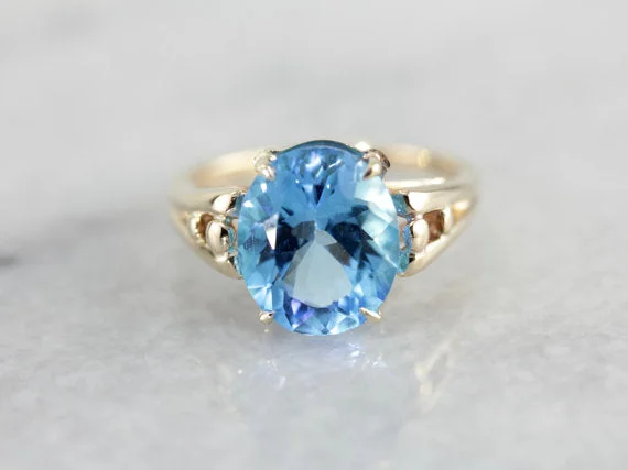 Citrine Gemstone Rings in a Modern Minimalist StyleBrilliant Blue Topaz, Accented Split Shank Solitaire Ring in Yellow Gold