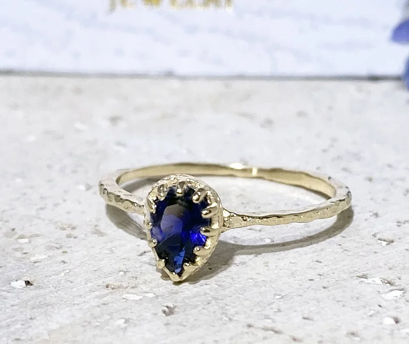 Topaz Gemstone Rings with a Faceted Cut and Shimmering EffectBlue Sapphire ring - September Birthstone - Delicate Hammered Ring with Pear Shape Blue Sapphire Gemstone