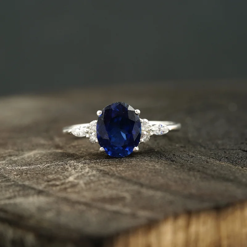 Malachite Gemstone Rings with a Marble - like PatternOval Cut Blue Sapphire Sterling Silver Engagement Ring