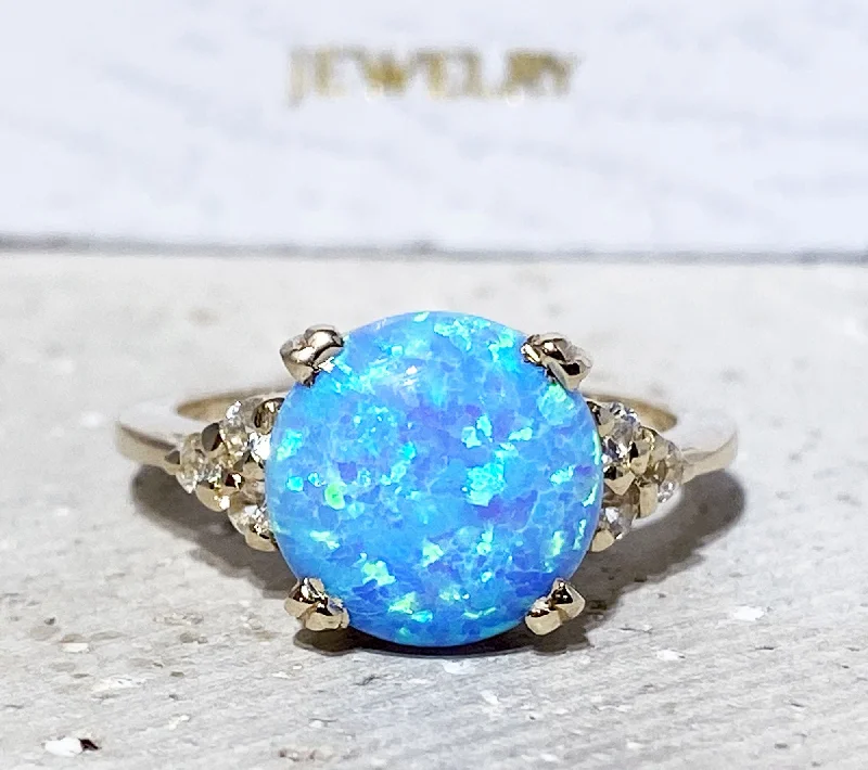 Opal Gemstone Rings with a Rainbow - Hued Play of ColorBlue Opal Ring - October Birthstone - Statement Engagement Ring with Round Blue Opal Middle Gemstone and Clear Quartz Accents