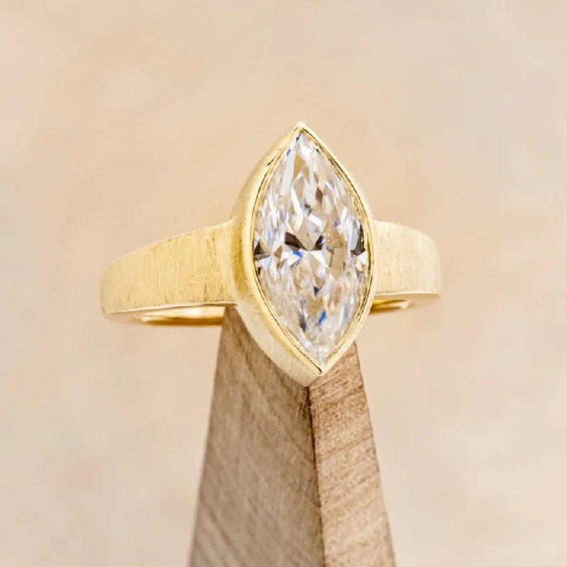 "SADIE" - SOLITAIRE BEZEL SET MARQUISE MOISSANITE ENGAGEMENT RING WITH A SATIN FINISH