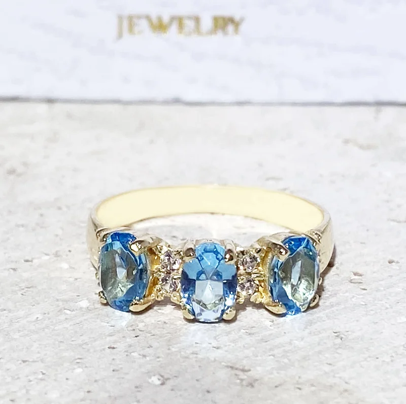 Moonstone Gemstone Rings with a Mysterious SheenBlue Topaz Ring - December Birthstone - Three Oval Blue Topz Gemstones Ring with Clear Quartz Accents