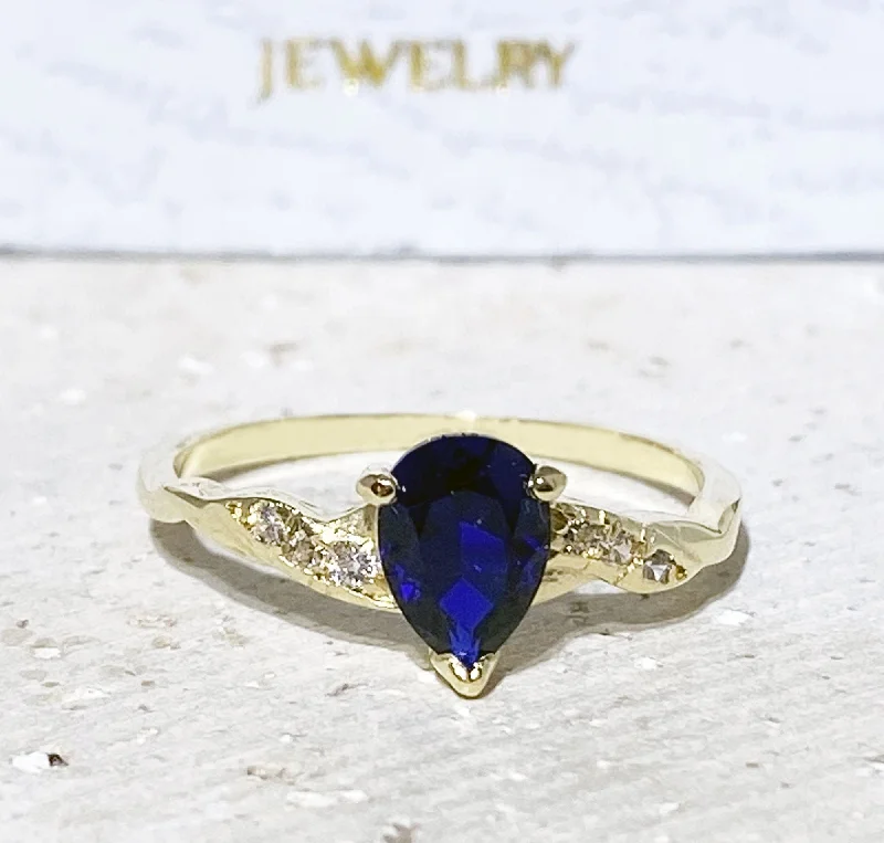 Amethyst Gemstone Rings with Sterling Silver Braided BandsBlue Sapphire Ring - September Birthstone - Tiny Delicate Ring with Pear-Shaped Blue Sapphire Gemstone and Clear Quartz Accents