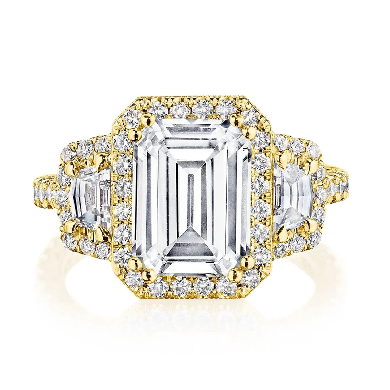 Diamond Rings with a Bezel - Set Center Stone for DurabilityEmerald 3-Stone Engagement Ring