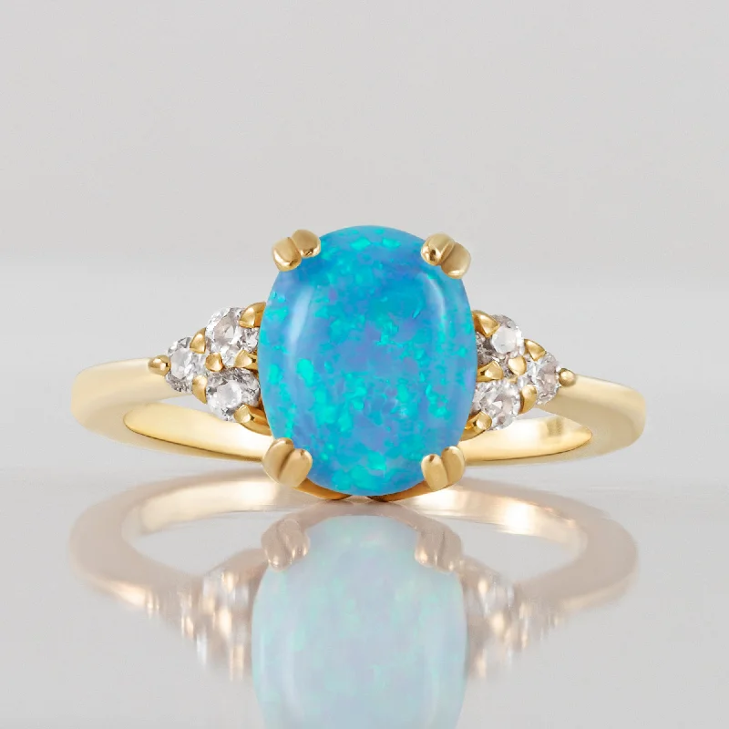 Tourmaline Gemstone Rings in a Multicolor ArrayBlue Opal Ring - October Birthstone - Oval Blue Opal Gemstone Statement Engagement Ring with Clear Quartz Accents