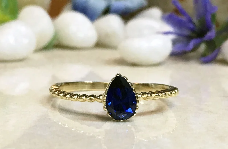 Aquamarine Gemstone Rings with a Nautical - Themed SettingBlue Sapphire Ring - September Birthstone - Tiny Stacking Ring with Pear-Shaped Blue Sapphire Gemstone