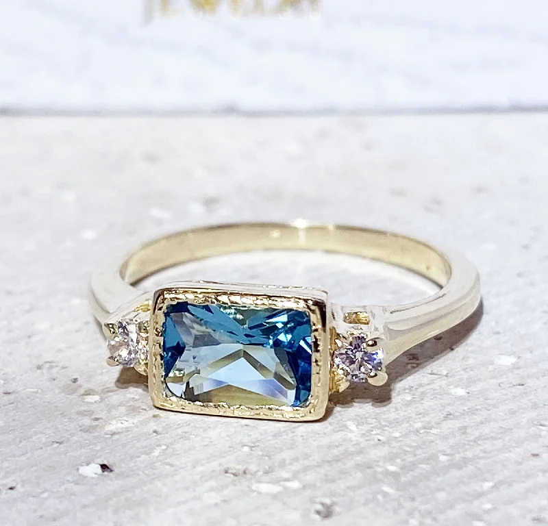 Peridot Gemstone Rings with a Floral - Motif BandBlue Topaz Ring - December Birthstone - Simple Ring with Octagon Blue Topaz and Clear Quartz Accents