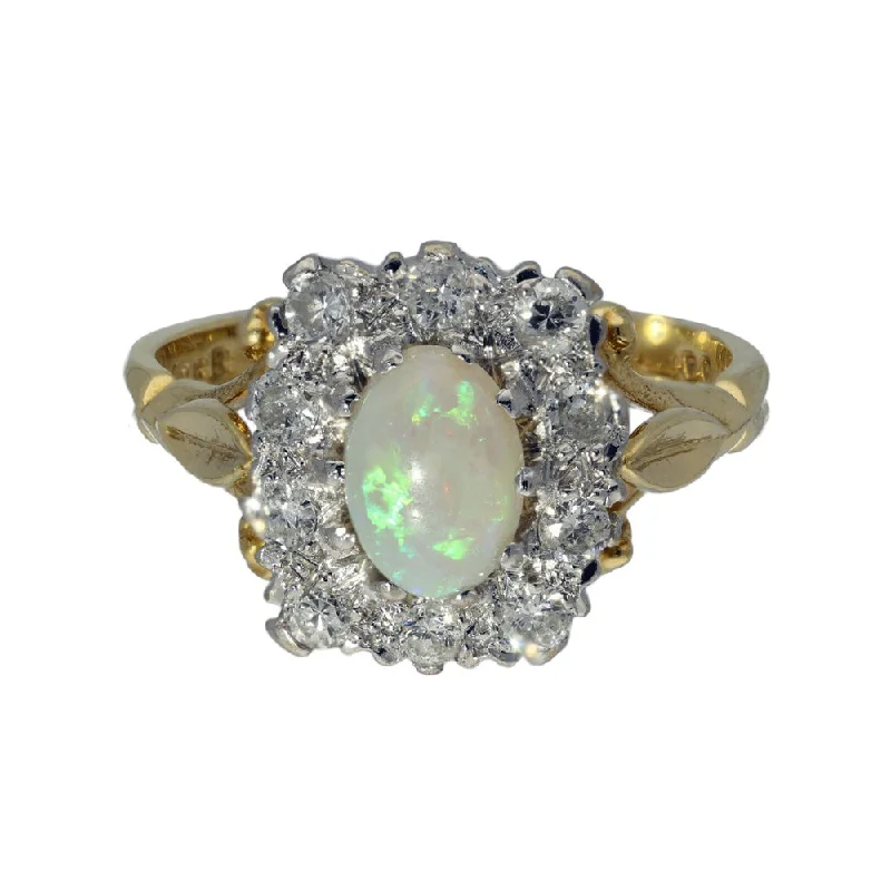 Topaz Gemstone Rings with a Faceted Cut and Shimmering EffectPre-owned 18ct Yellow Gold Opal and Diamond Halo Cluster Ring