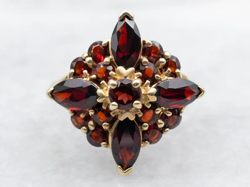 Garnet Gemstone Rings with a Vintage - Style Bezel SettingVintage Gold and Garnet Cluster Ring