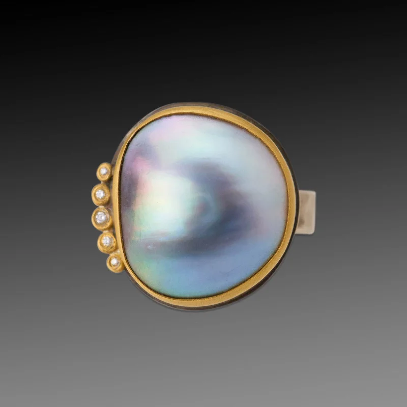 Topaz Gemstone Rings with a Faceted Cut and Shimmering EffectTahitian Pearl Ring