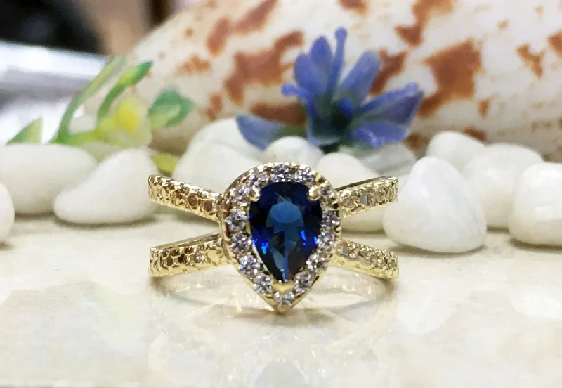 Lapis Lazuli Gemstone Rings with Gold - Leaf InclusionsBlue Sapphire Ring - September Birthstone - Engagement Ring with Pear Shape Blue Sapphire Center Stone and Clear Quartz Halo