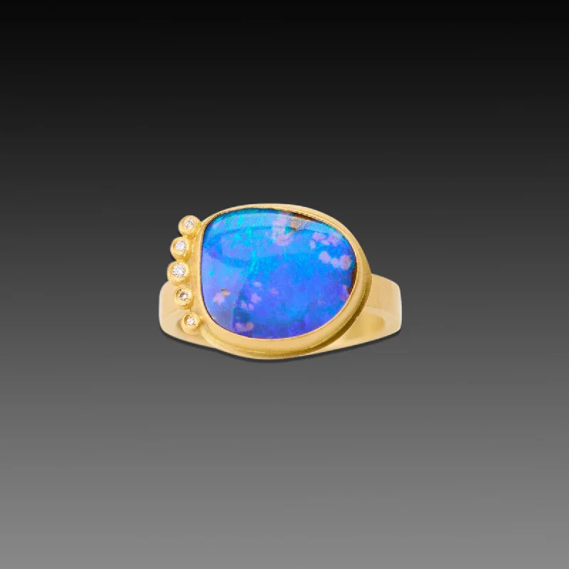 Tanzanite Gemstone Rings with Platinum Milgrain DetailingGlowing Boulder Opal Ring