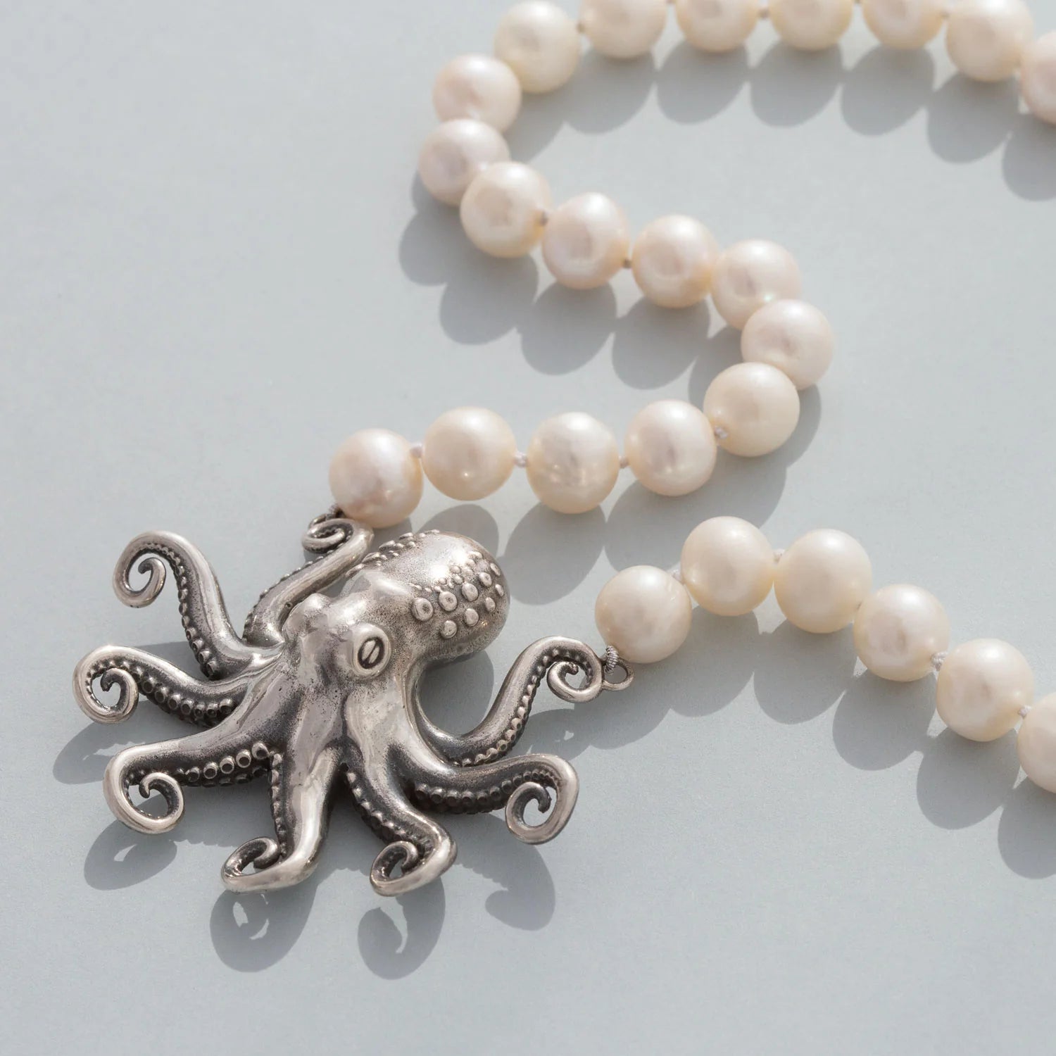 Medallion - Pendant Necklaces with Intricate Relief - Style ArtworkMedallion - Pendant Necklaces with Intricate Relief - Style ArtworkNick Von K - Kraken Octopus Pearl Necklace